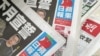 Copias de los periódicos Apple Daily de Next Digital se ven en un quiosco en Hong Kong, el 17 de junio de 2021.