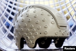 An electroencephalogram (EEG) enabled helmet, due to be used in an experiment on the effects of a microgravity environment on the brain activity of astronauts is shown at Israeli startup Brain.Space in Tel Aviv, Israel on March 22, 2022. (REUTERS/Nir Elias)