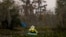 FILE - A kayaker paddles amidst changing foliage in the Maurepas Swamp in Ruddock, La., Dec. 13, 2020. 
