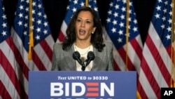 Sen. Kamala Harris, D-Calif., speaks during a news conference with Democratic presidential candidate former Vice President Joe Biden at the Hotel DuPont in Wilmington, Del., Aug. 13, 2020. 