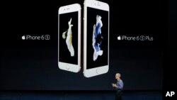 Apple CEO Tim Cook discusses the new iPhone 6s and iPhone 6s Plus during the Apple event at the Bill Graham Civic Auditorium in San Francisco, Sept. 9, 2015.