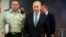 Israel's Prime Minister Benjamin Netanyahu (R) arrives to the weekly cabinet meeting in Jerusalem, Jan. 5, 2014. 