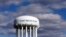 FILE - The Flint Water Plant water tower is seen in Flint, Michigan, March 21, 2016. Researchers from Virginia Tech say the lead levels in the city's drinking water is decreasing. 