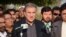 FILE - Pakistani Foreign Minister Shah Mehmood Qureshi talks with media representatives in Multan, Pakistan, Dec. 22, 2018. 