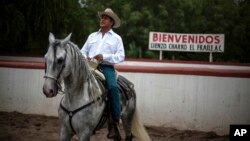 FILE - This June 7, 2015 file photo shows Jaime Rodriguez, known as "El Bronco," then an independent candidate for governor, on his horse, in Villa de Garcia, Mexico. Mexico's top electoral court has ordered on Tuesday, April 10, 2018, that Rodriguez be added to the ballot for the July 1, 2018, presidential election.