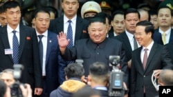 North Korean leader Kim Jong Un waves upon arrival by train in Dong Dang, a Vietnamese border town, Feb. 26, 2019, ahead of his second summit with U.S. President Donald Trump.