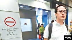 苹果日报图片
民主派立法会议员梁继昌从澳门返回
