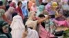 Muslims gather for Eid al-Fitr prayers, which marks the end of the holy month of Ramadan, at the Bajra Sandhi Monument in Denpasar on the Indonesian resort island of Bali on April 10, 2024.