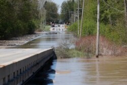 The Tittabawassee River overflows in Freeland, Mich., May 20, 2020.