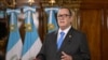El presidente de Guatemala asegura en la OEA un traspaso pacífico de poder
