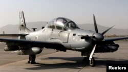 FILE - An A-29 Super Tucano aircraft sits parked at Kandahar Air Base, Afghanistan Oct. 7, 2017.