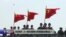 热点快评:八一阅兵军旗走在国旗前是否涉嫌违法?