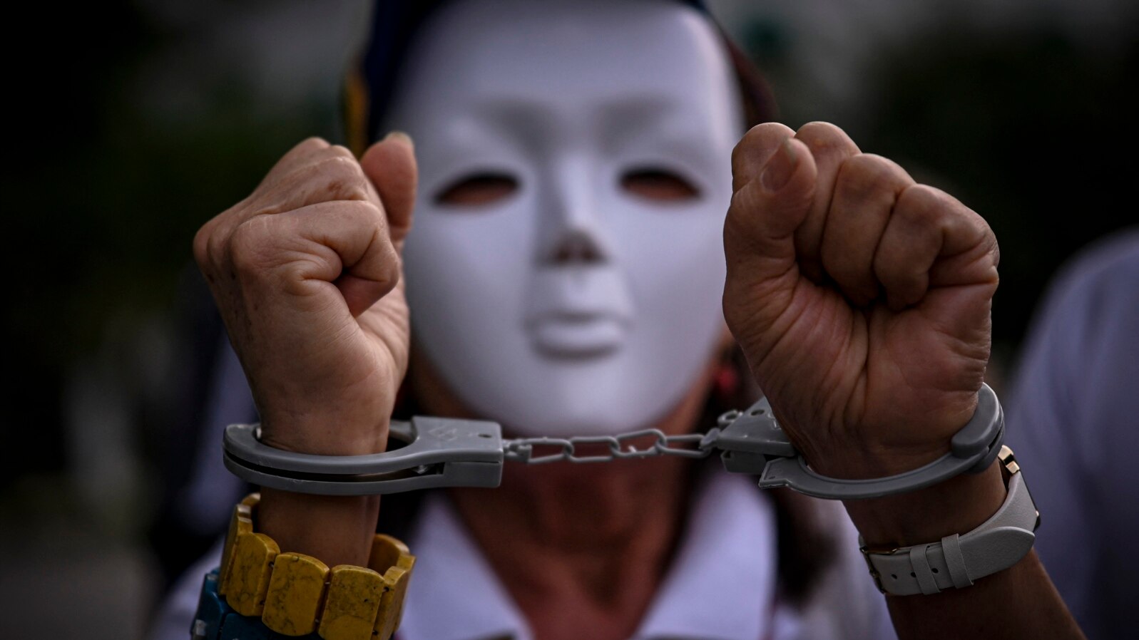 A handcuffed women attends a rally to protest the Venezuelan July 28 disputed presidential election in Panama City, Sept. 28, 2024. The rally was one of several held outside Venezuela.