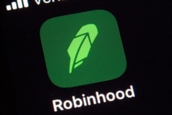 FILE - This shows the logo for the Robinhood app on a smartphone in New York, Dec. 17, 2020.