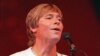 FILE--John Denver is shown performing in Moscow, July 1, 1985.