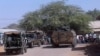 FILE - Kenya Defence Forces soldiers arrive at the scene of an attack claimed by al-Shabab militants in the northeastern town of Mandera, Kenya, Oct. 25, 2016. Security officials say 10 suspected al-Shabab militants were killed Jan. 18, 2023, at a hideout in Garissa County. 