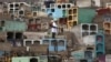 A health worker fumigates to prevent Dengue, Chikungunya and Zika virus, at Martires 19 de Julio cemetery in the outskirts of Lima, Peru, Feb. 9, 2016. 