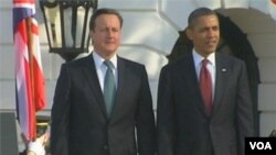 Presiden Obama bersama Perdana Menteri Inggris David Cameron di Gedung Putih (14/3).