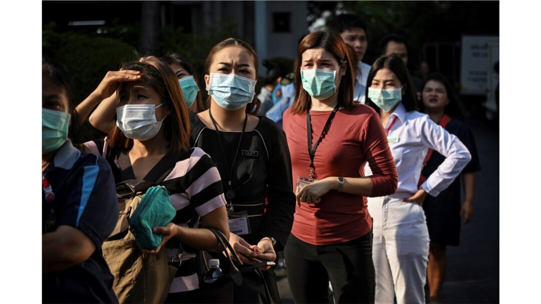 People line up to buy face masks amid concerns about the spread of the coronavirus, outside a shopping mall in Bangkok, Thailand, March 5, 2020.