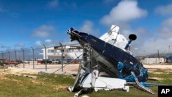 A damaged plane sits at the airport after Super Typhoon Yutu hit the U.S. Commonwealth of the Northern Mariana Islands, Oct. 26, 2018, in Garapan, Saipan.