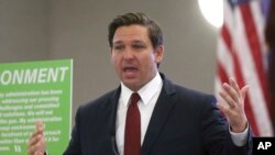 In this Oct. 29, 2019, file photo, Gov. Ron DeSantis speaks at a news conference on in Tallahassee, Fla. 