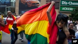 FILE — Members of the LGTBQ community take part in a Pride march in Sandton, Johannesburg, October 29, 2022.