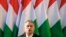 FILE - In this Friday, April 6, 2018 file photo Hungary's Prime Minister Viktor Orban speaks during the final electoral rally of his Fidesz party in Szekesfehervar, Hungary. 