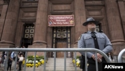 A Pennsylvania State Trooper stands guard outside Cathedral Basilica of Saints Peter and Paul before the arrival of Pope Francis on Sept. 26, 2015 in Philadelphia, Pennsylvania. 