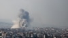 Smoke rises over Beirut's southern suburbs after a strike, amid ongoing hostilities between Hezbollah and Israeli forces