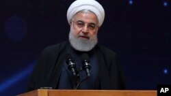 Presiden Iran Hassan Rouhani mengecam Amerika Serikat saat berbicara di Teheran hari Selasa (9/4). 