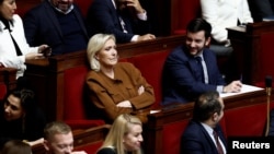 French far-right leader and member of parliament Marine Le Pen listens at the National Assembly in Paris, France, Jan. 14, 2025.