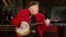 FILE - Roy Clark performs at the 50th annual CMA Awards at the Bridgestone Arena on Nov. 2, 2016, in Nashville, Tenn. 