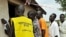 Residents of the remote south central Southern Sudan village of Nyal line up to register their names at a local school being used as a voter registration office, 15 Nov 2010.