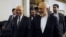 Sartaj Aziz, left, adviser to Pakistan's prime minister on foreign affairs, escorts Iranian Foreign Minister Javad Zarif to their meeting at the Foreign Ministry in Islamabad, April 8, 2015. 