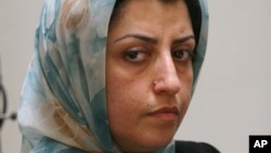 FILE - Iranian human rights activist Narges Mohammadi attends a meeting on women's rights in Tehran, Iran, on Aug. 27, 2007. Mohammadi's family said on May 18, 2024, that she is going to trial again in Iran, this time for accusations over sexual assault of women prisoners.