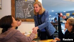 Democratic candidate for the U.S. Congress Maura Sullivan greets voters at Laney & Lu in Exeter, New Hampshire, U.S., Sept. 10, 2018.