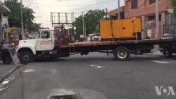 Ayiti: Manifestan yo Itilize yon Kamyon pou Bloke Lari a