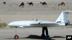 In this photo released by the Iranian army on Oct. 3, 2023, a drone is seen during the air force's nationwide drone drill centered in northern Semnan province, Iran. (Iranian Army via AP)