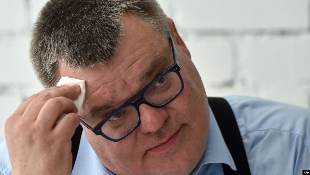Presidential candidate Viktor Babaryko is seen in Minsk, June 11, 2020. In the lead-up to the August 9 election, he was arrested on suspicion of financial crimes, and scores opposing the Belarusian regime were detained. Those held included 14 journalists.