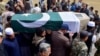 Mourners carry the coffin of a victim of the train attack, for a funeral prayer in Quetta, Pakistan's southwestern Balochistan province, March 13, 2025.