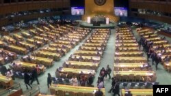 Diplomats from the Lima Group (front and right) leave the United Nations General Assembly in protest on April 24, 2019, in New York, as Venezuelan Foreign Minister, Jorge Arreaza, starts speaking about multilateralism.