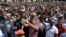 Madagascar demonstrators from the opposition chant slogans as they protest after the president denounced unrest in which two people were killed as a "coup" intended to divide the country's people in Antananarivo, Madagascar, April 23, 2018. 