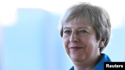 British Prime Minister Theresa May arrives for the Conservative Party Conference in Birmingham, England, Sept. 29, 2018.