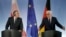 German Foreign Minister Frank-Walter Steinmeier, right, and Foreign Minister of Poland, Grzegorz Schetyna, left, address the media during a joint news conference after a meeting in Berlin, Germany, March 5, 2015. 