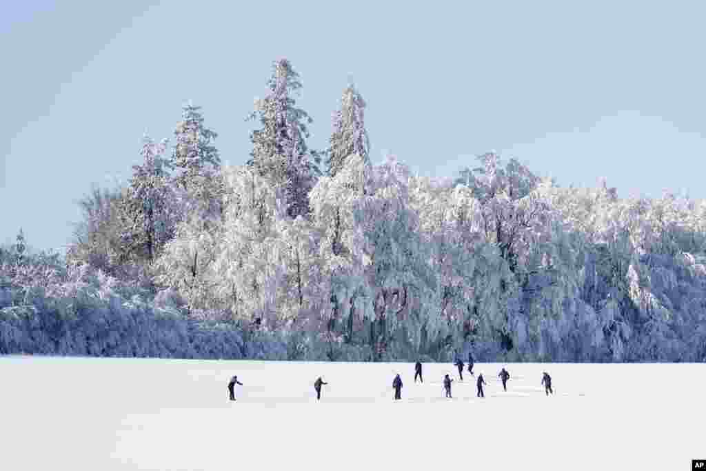 Cross country skiers enjoy a freezing sunny afternoon near Nove Mesto na Morave, Czech Republic.