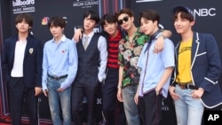 BTS arrives at the Billboard Music Awards at the MGM Grand Garden Arena on Sunday, May 20, 2018, in Las Vegas. (Photo by Jordan Strauss/Invision/AP)