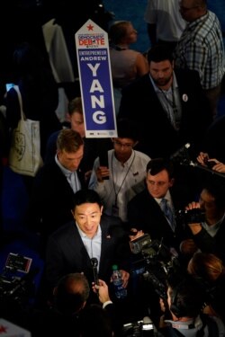 FILE - Democratic presidential candidate entrepreneur Andrew Yang is interviewed, Sept. 12, 2019, after a Democratic presidential primary debate hosted by ABC at Texas Southern University in Houston.