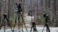 Television news cameras are lined up outside of the house where Germanwings A320 plane crash victim Yvonne Selke is presumed to have lived in Nokesville, Virginia, March 25, 2015.