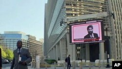 A giant electronic display outside the World Bank's headquarters in Washington, D.C., is tallying the number of chronically hungry people in the world today, April 2011