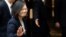 FILE - Taiwan President Tsai Ing-wen leaves a luncheon during a stop-over after her visit to Latin America in Burlingame, California, U.S.